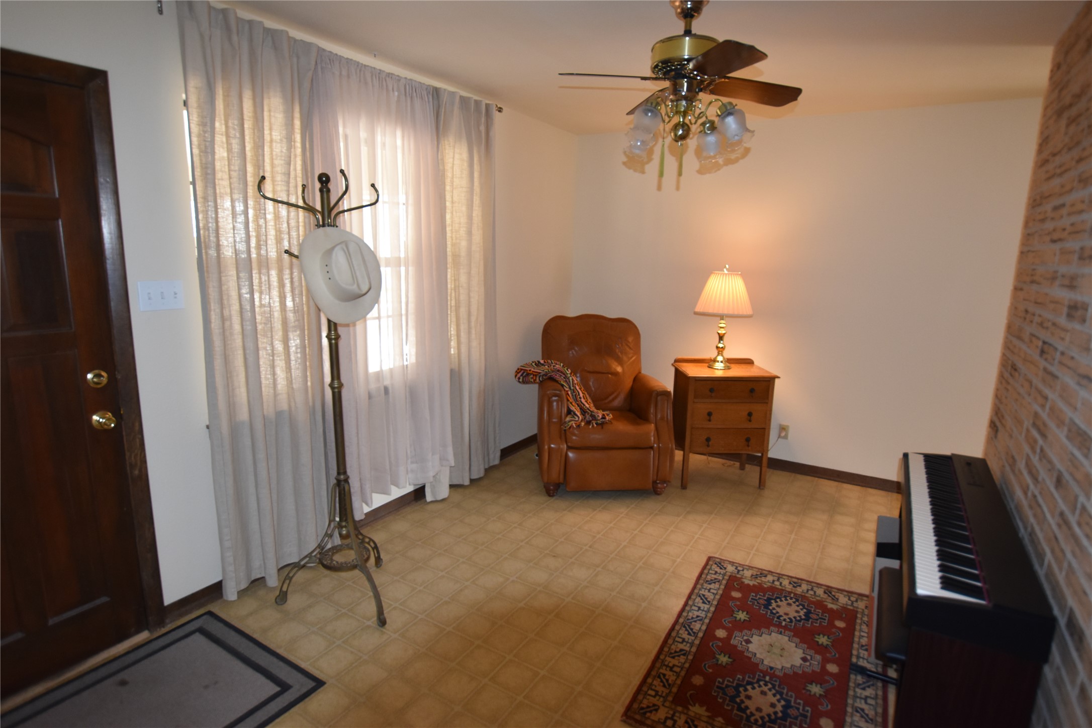 687 Fm 812 Road Red Rock, TX 78662 - Photo 14 of 40 Entrance foyer with tile patterned floors and a ceiling fan