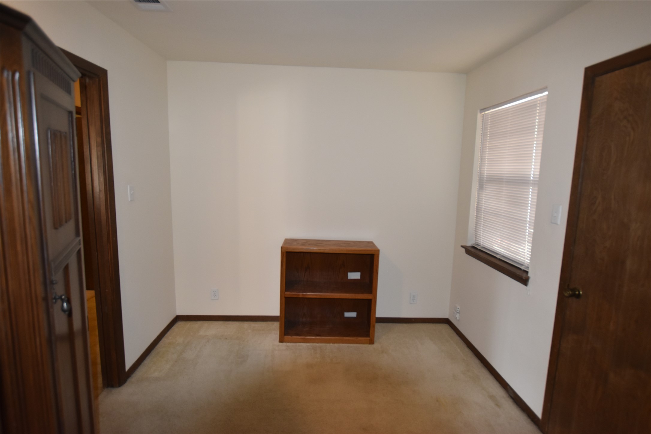 687 Fm 812 Road Red Rock, TX 78662 - Photo 15 of 40 Empty room featuring light carpet and baseboards