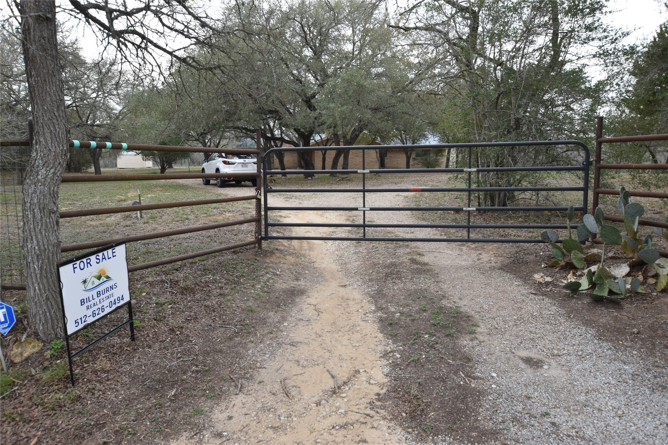 687 Fm 812 Road Red Rock, TX 78662 - Photo 2 of 40 View of front gate