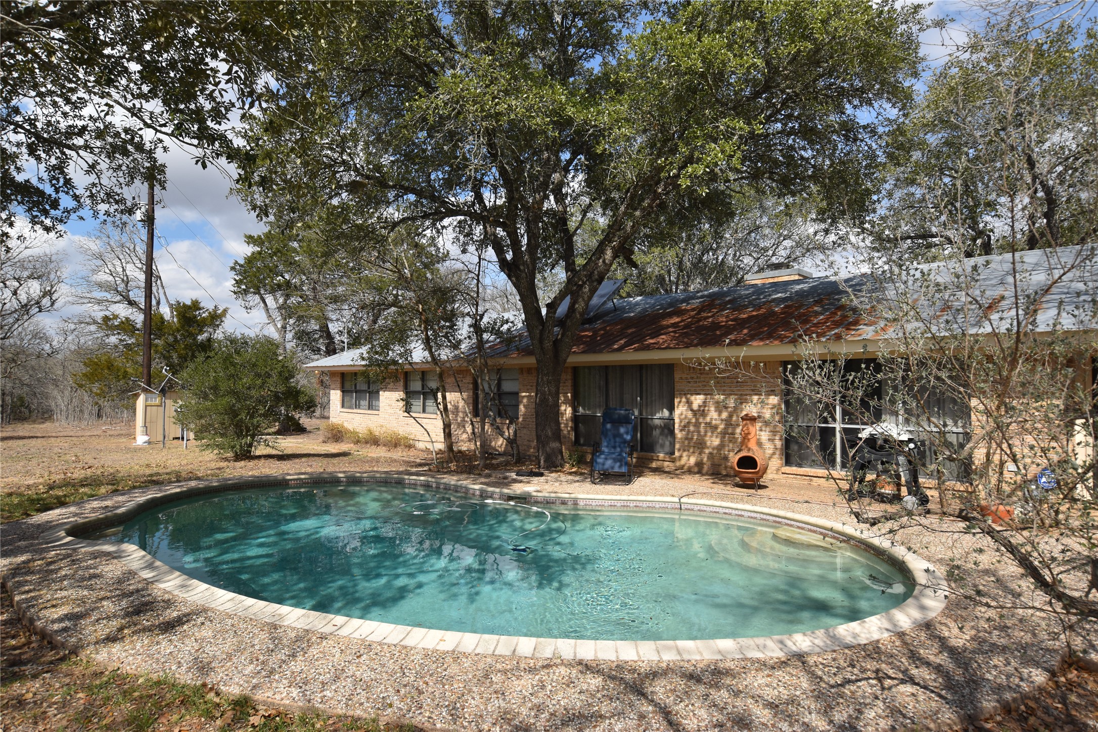 687 Fm 812 Road Red Rock, TX 78662 - Photo 24 of 40 Outdoor pool with a patio