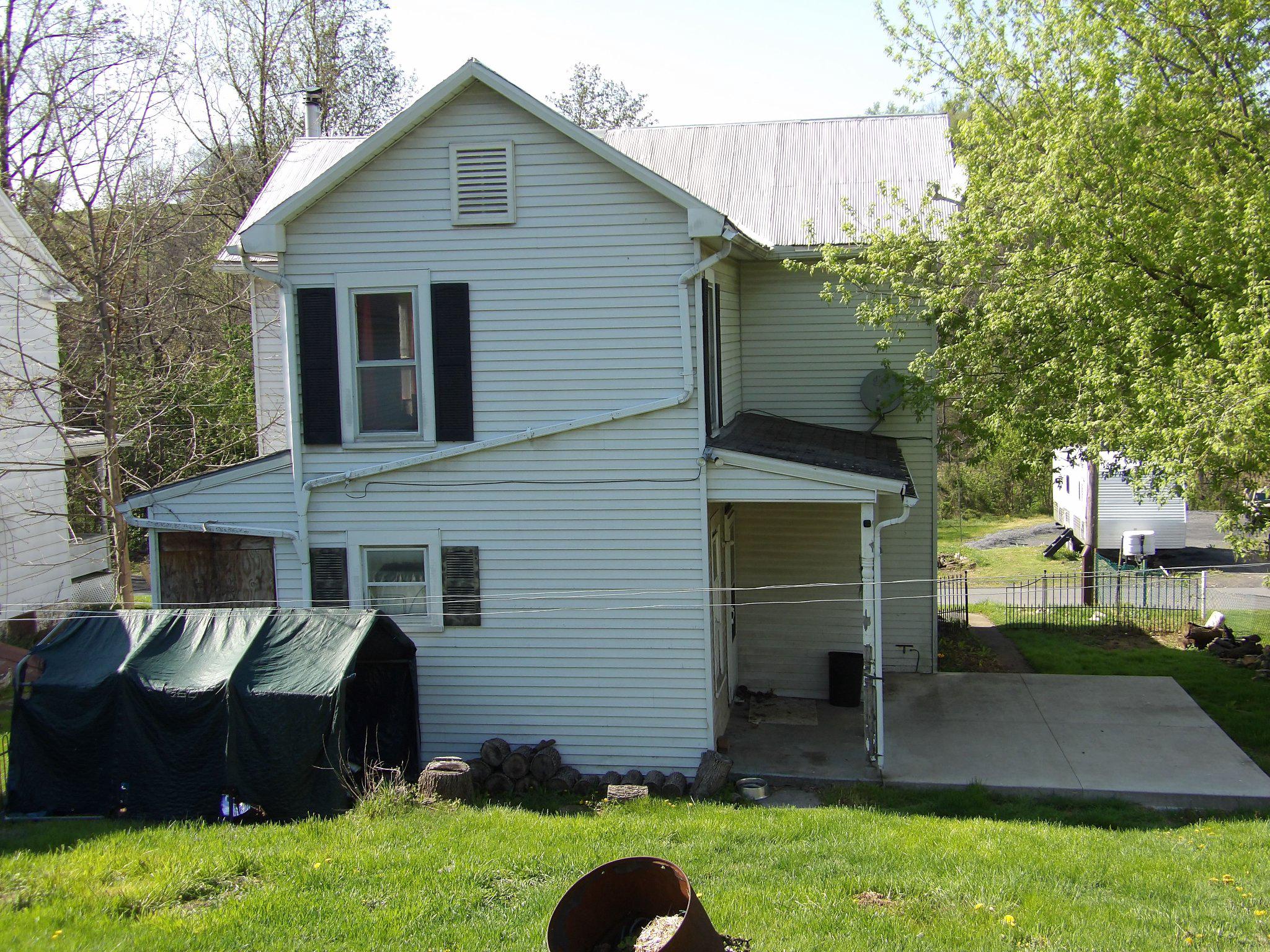 274 West Railroad Street Reedsville, PA 17084 - Photo 28 of 32 a front view of a house with a yard