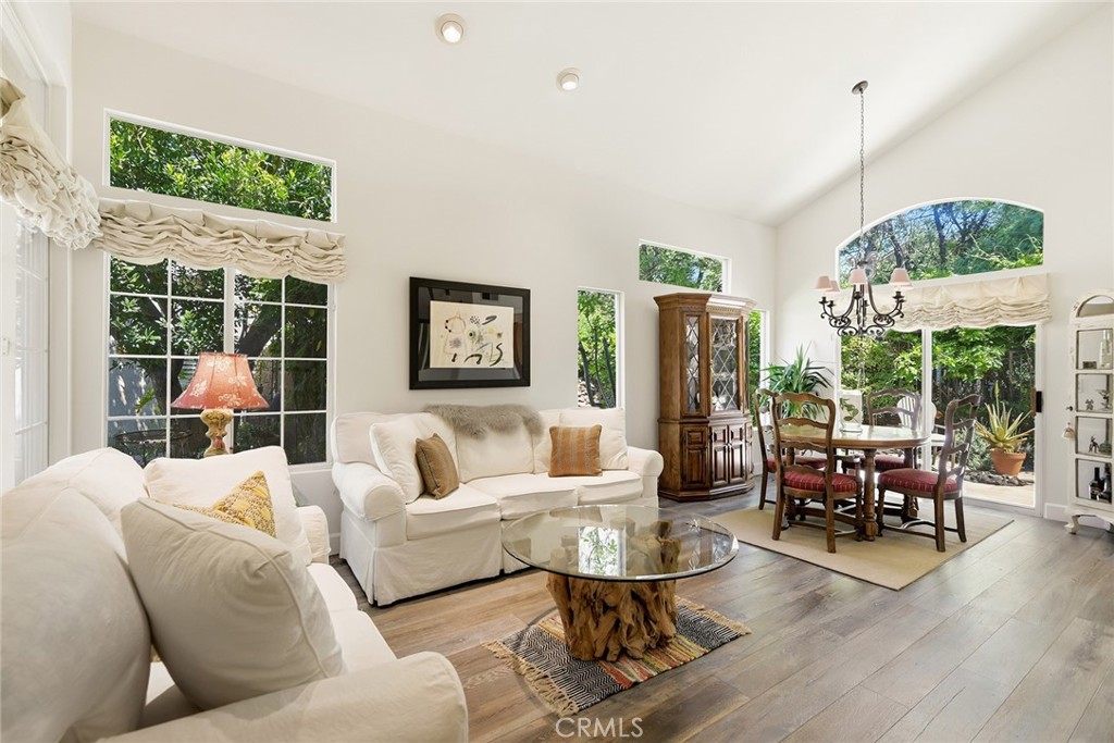 4762 Rhapsody Drive Oak Park, CA 91377 - Photo 6 of 29 a living room with furniture and a large window