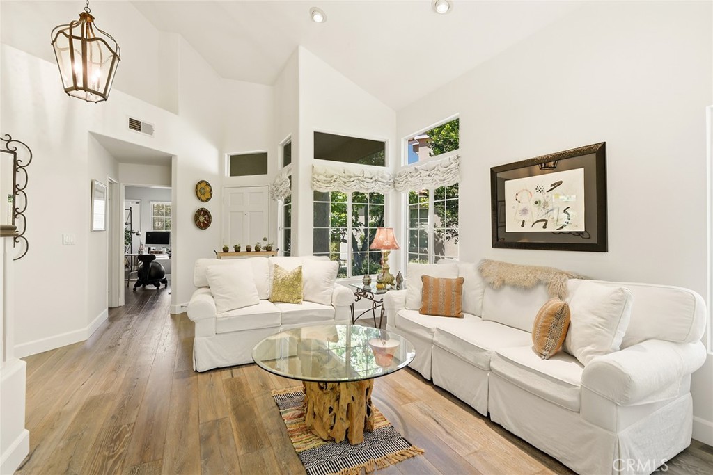 4762 Rhapsody Drive Oak Park, CA 91377 - Photo 8 of 29 a living room with furniture and a large window