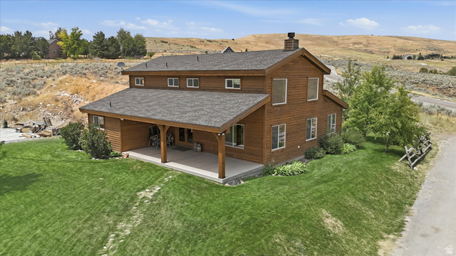 715 Ranch Loop Road Preston, ID 83263 - Photo 70 of 77 Two-story residence featuring wood siding and a covered patio