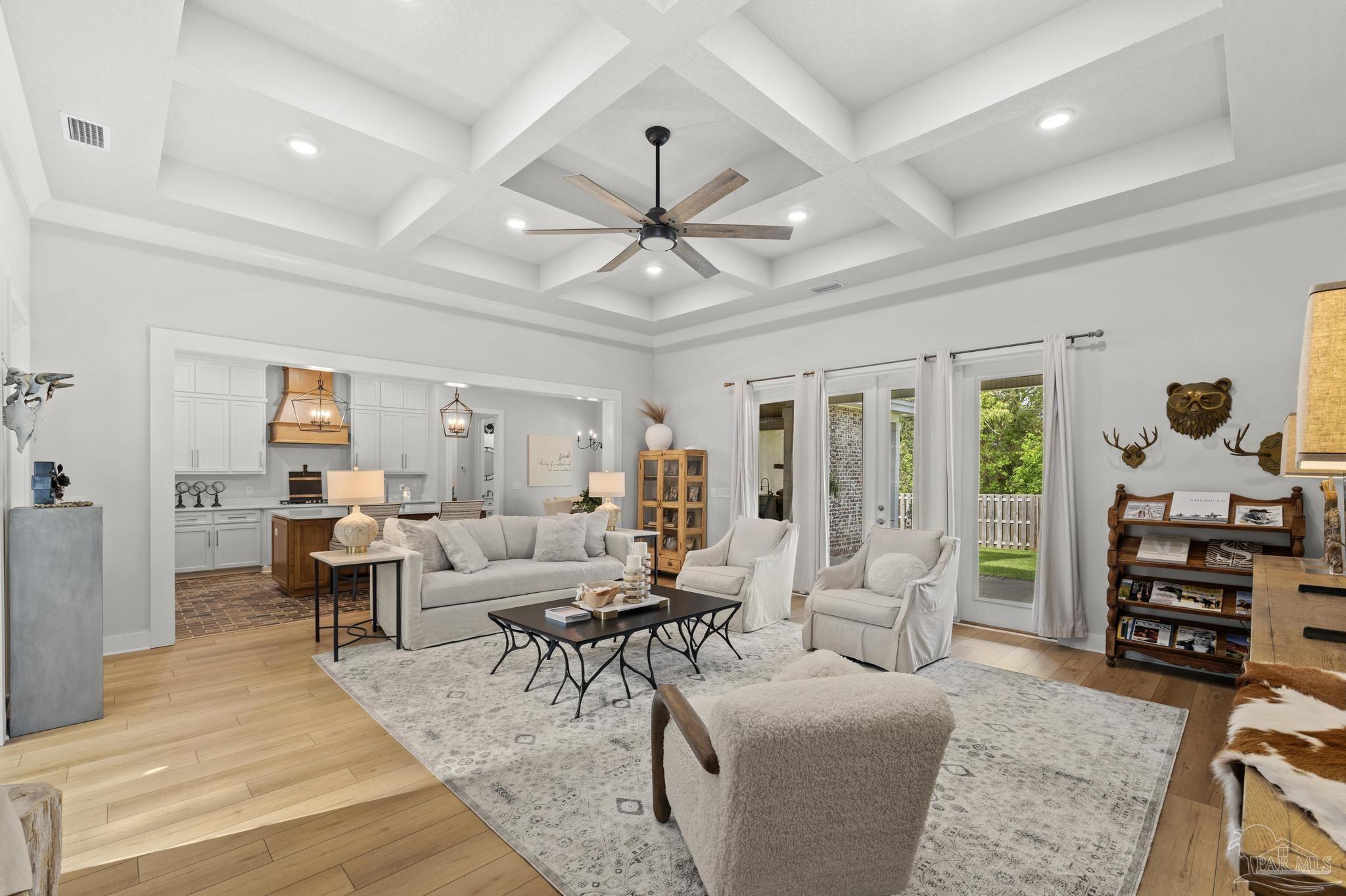 2031 Rambling Oaks Drive Cantonment, FL 32533 - Photo 11 of 62 a living room with furniture and wooden floor