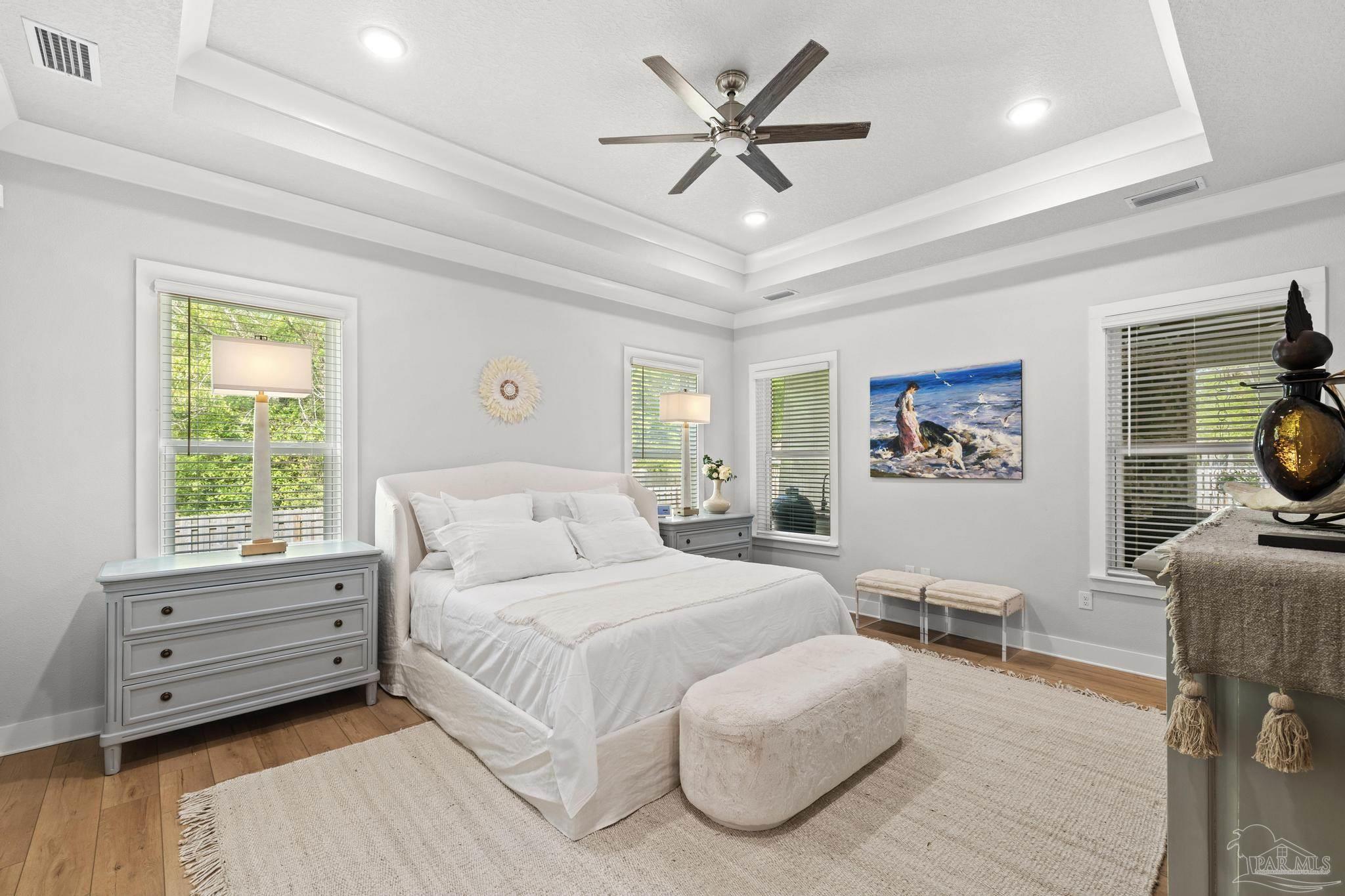 2031 Rambling Oaks Drive Cantonment, FL 32533 - Photo 27 of 62 a bedroom with a large bed and a window