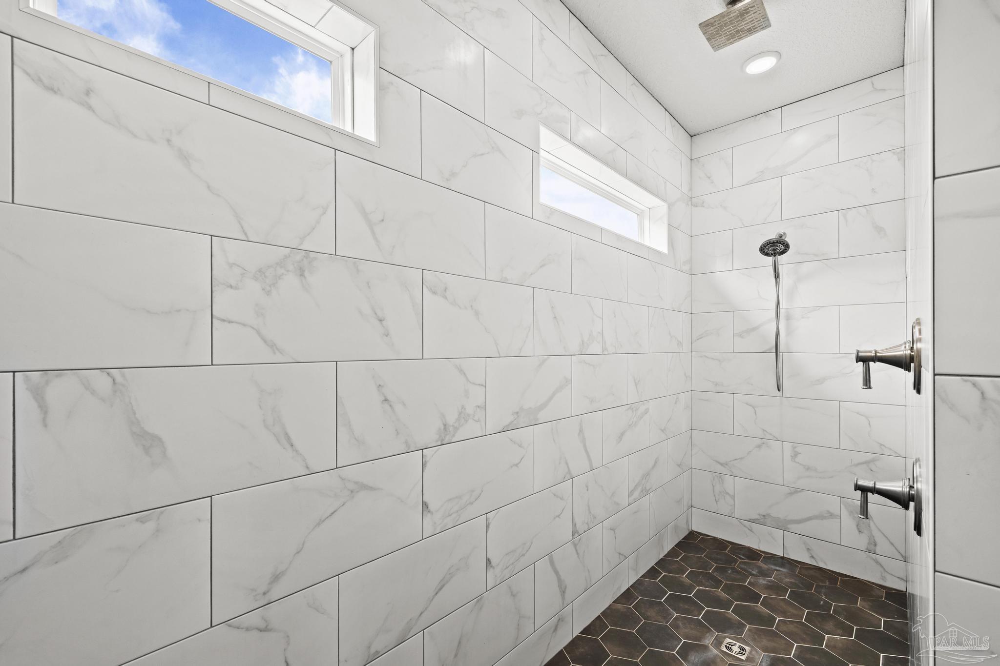 2031 Rambling Oaks Drive Cantonment, FL 32533 - Photo 33 of 62 a bathroom with a shower