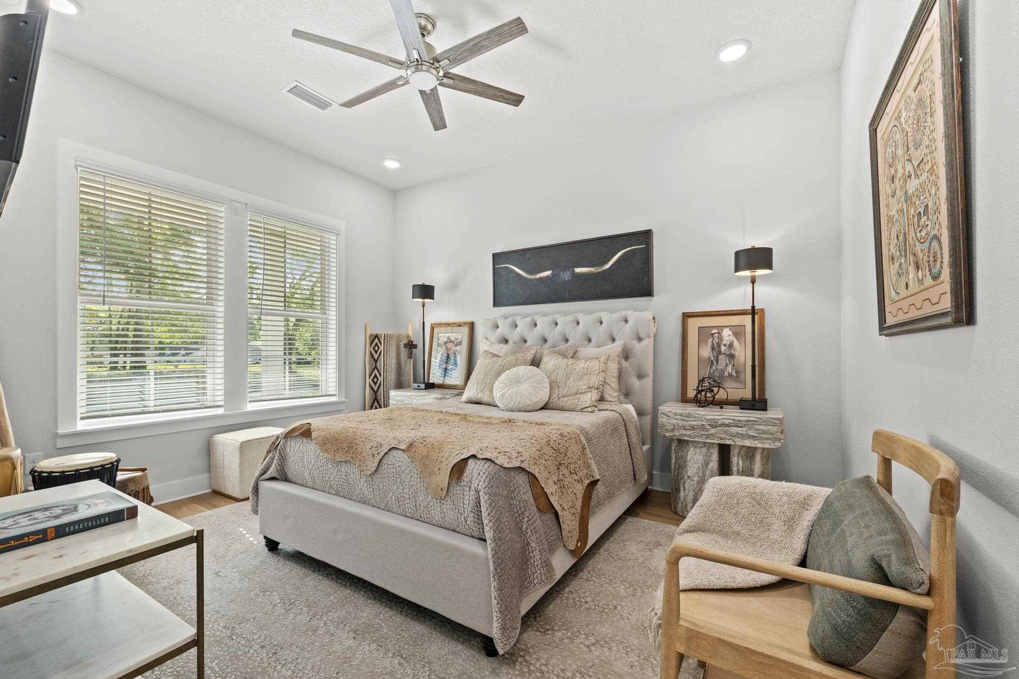 2031 Rambling Oaks Drive Cantonment, FL 32533 - Photo 37 of 62 a bedroom with furniture and a window