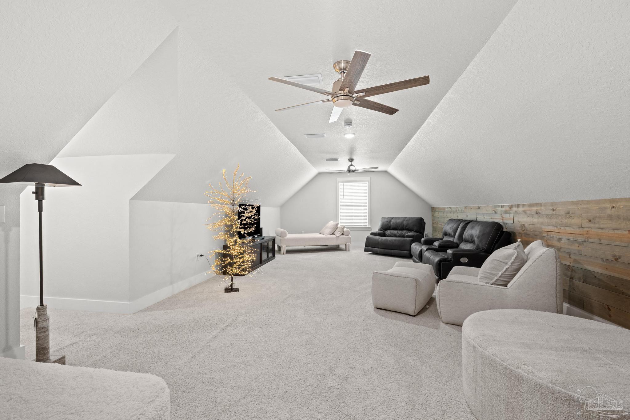 2031 Rambling Oaks Drive Cantonment, FL 32533 - Photo 51 of 62 a living room with furniture and a ceiling fan