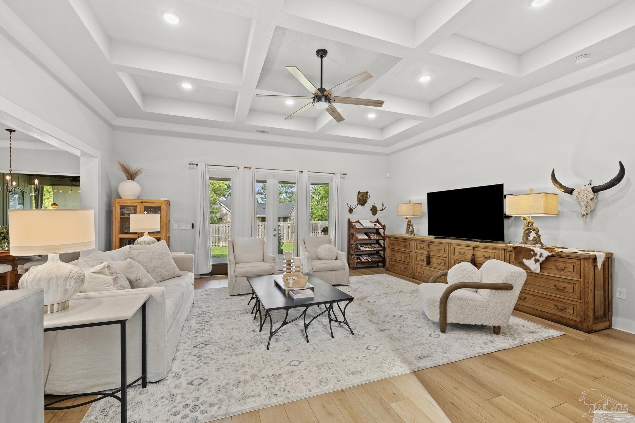 2031 Rambling Oaks Drive Cantonment, FL 32533 - Photo 9 of 62 a living room with furniture and a flat screen tv