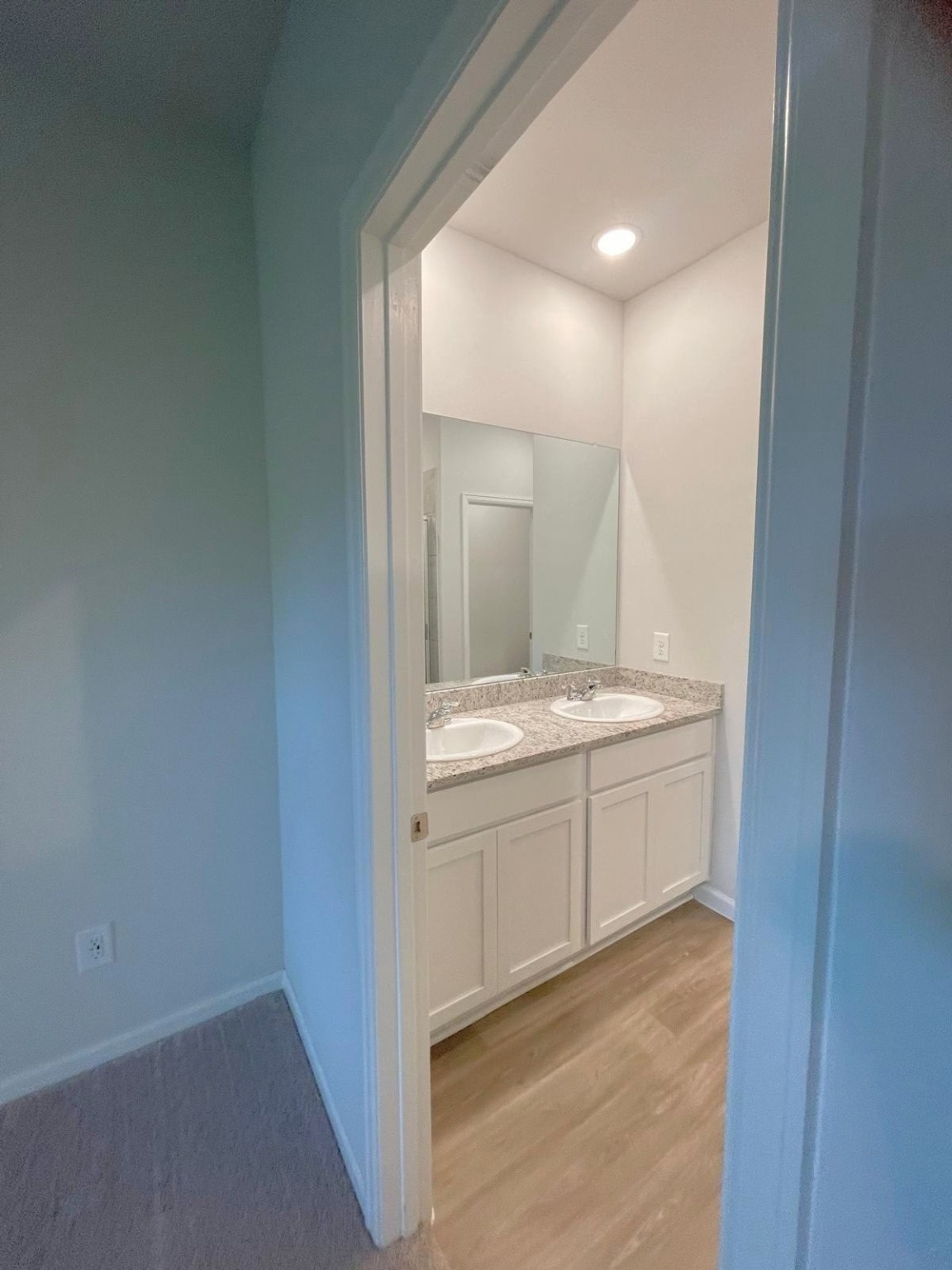 52 Valiant Ridge Trail Magnolia, TX 77354 - Photo 13 of 16 a bathroom with a sink and a mirror