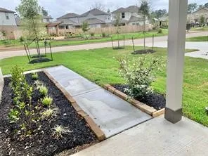 a view of a garden with a yard