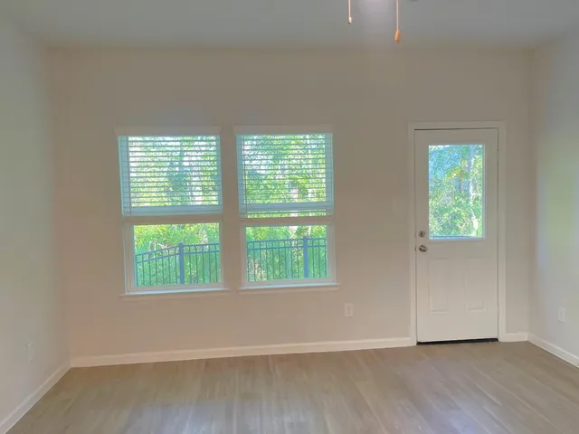 an empty room with windows