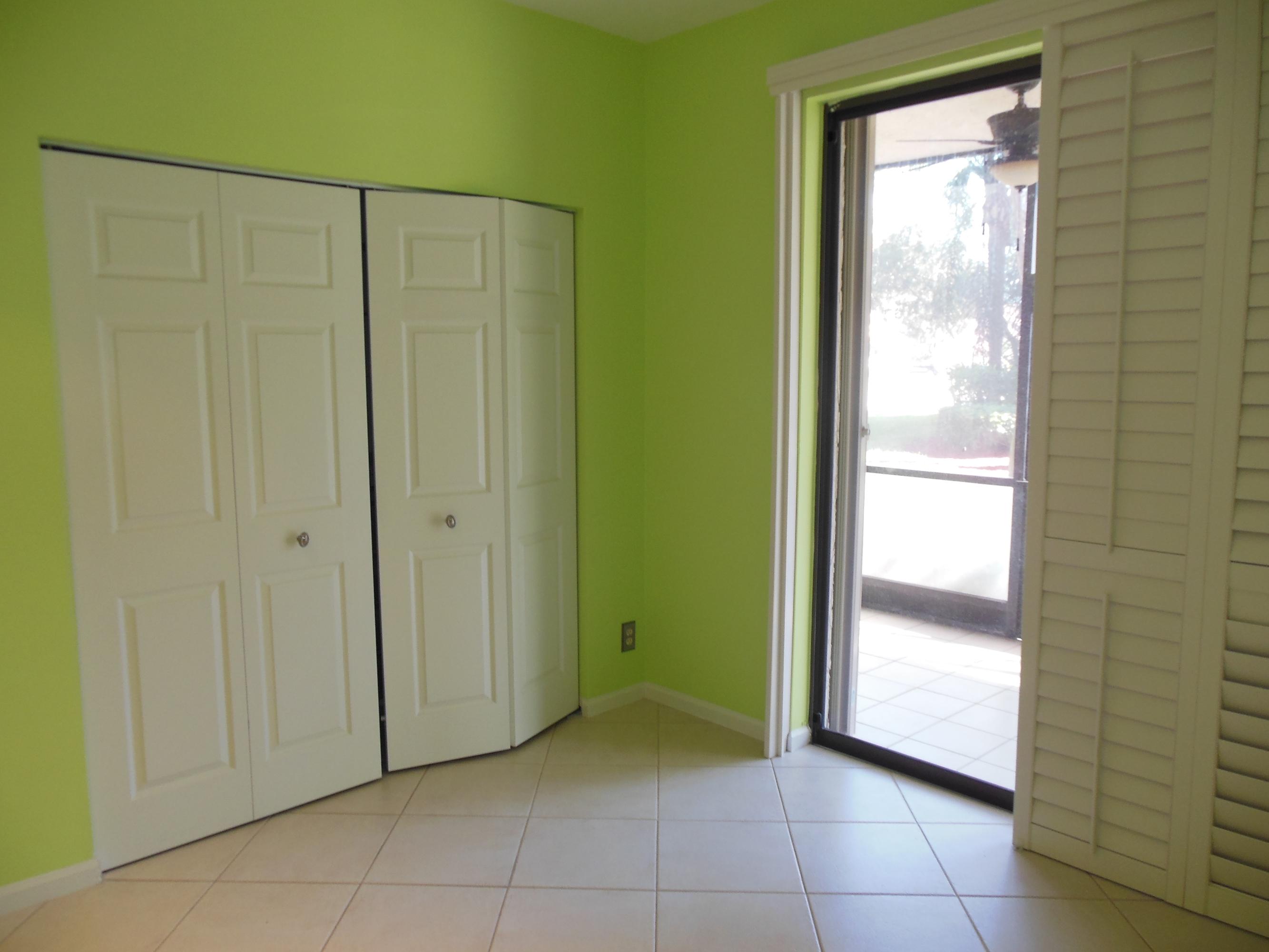 5780 Coach House Circle, Unit A Boca Raton, FL 33486 - Photo 14 of 37 Bedroom #2 w/slider to patio