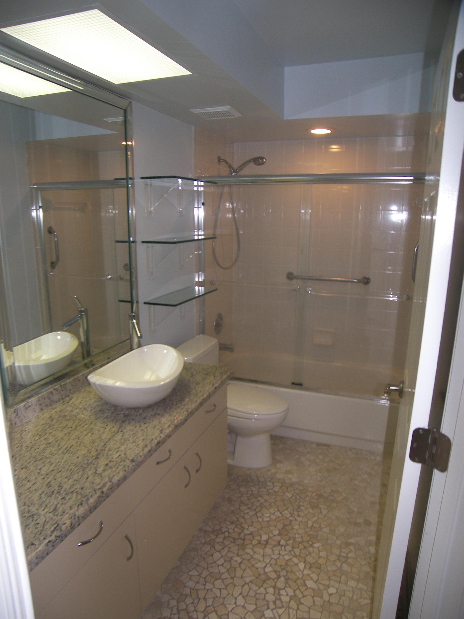 5780 Coach House Circle, Unit A Boca Raton, FL 33486 - Photo 16 of 37 Updated Hall Bathroom