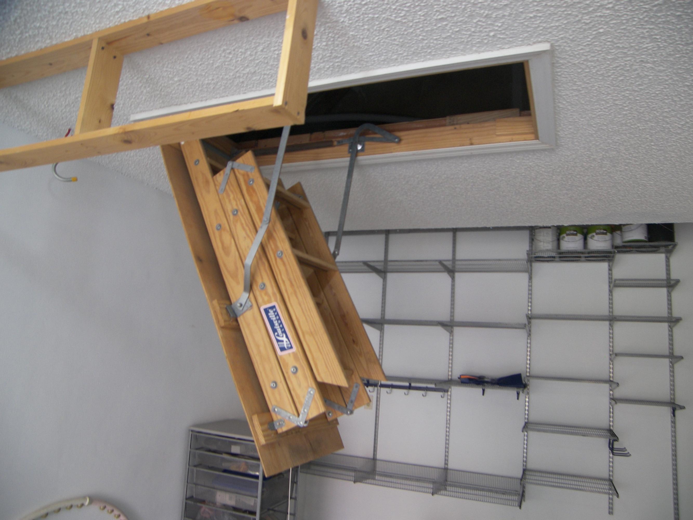 5780 Coach House Circle, Unit A Boca Raton, FL 33486 - Photo 32 of 37 Pulled down stairs to attic storage