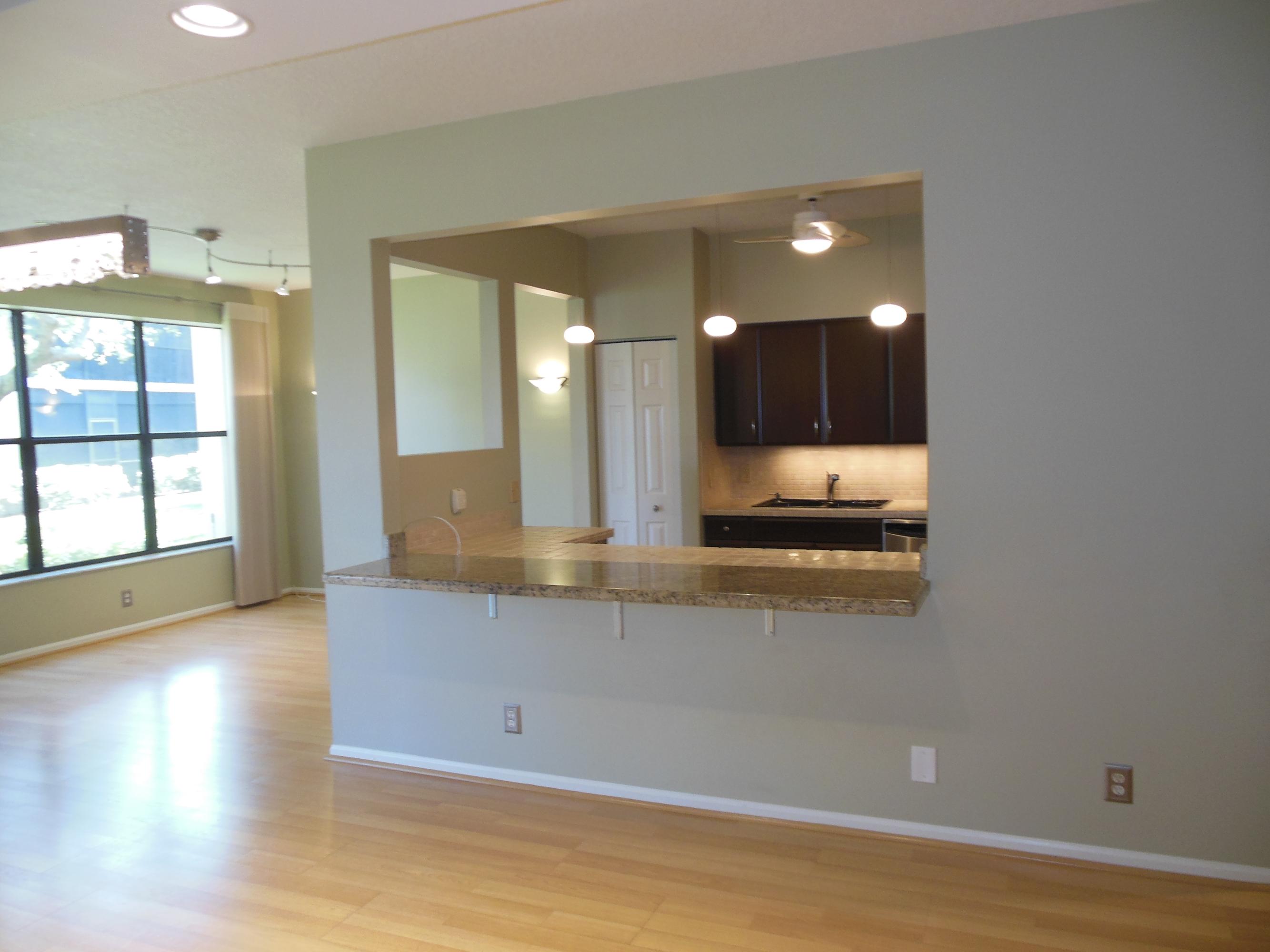 5780 Coach House Circle, Unit A Boca Raton, FL 33486 - Photo 4 of 37 Breakfast Bar from Kitchen