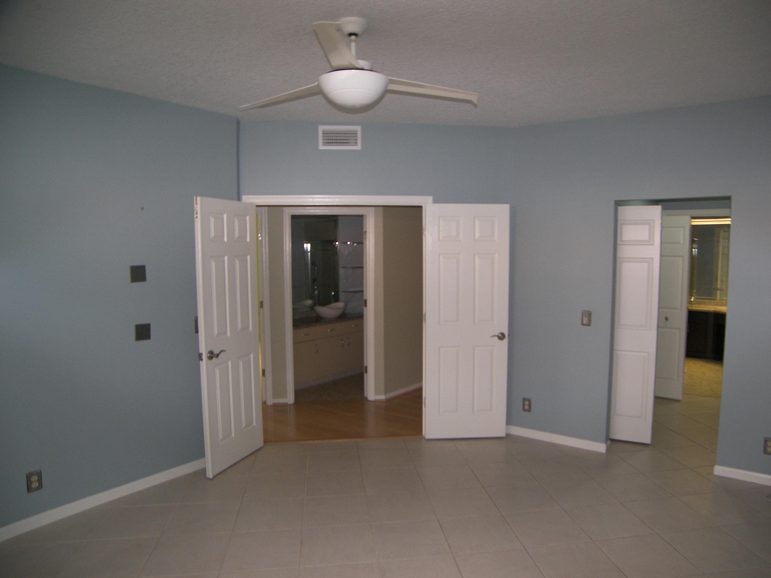 5780 Coach House Circle, Unit A Boca Raton, FL 33486 - Photo 9 of 37 Double door entry to Master Bedroom