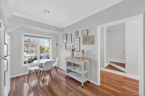 a bathroom with a sink vanity and a mirror