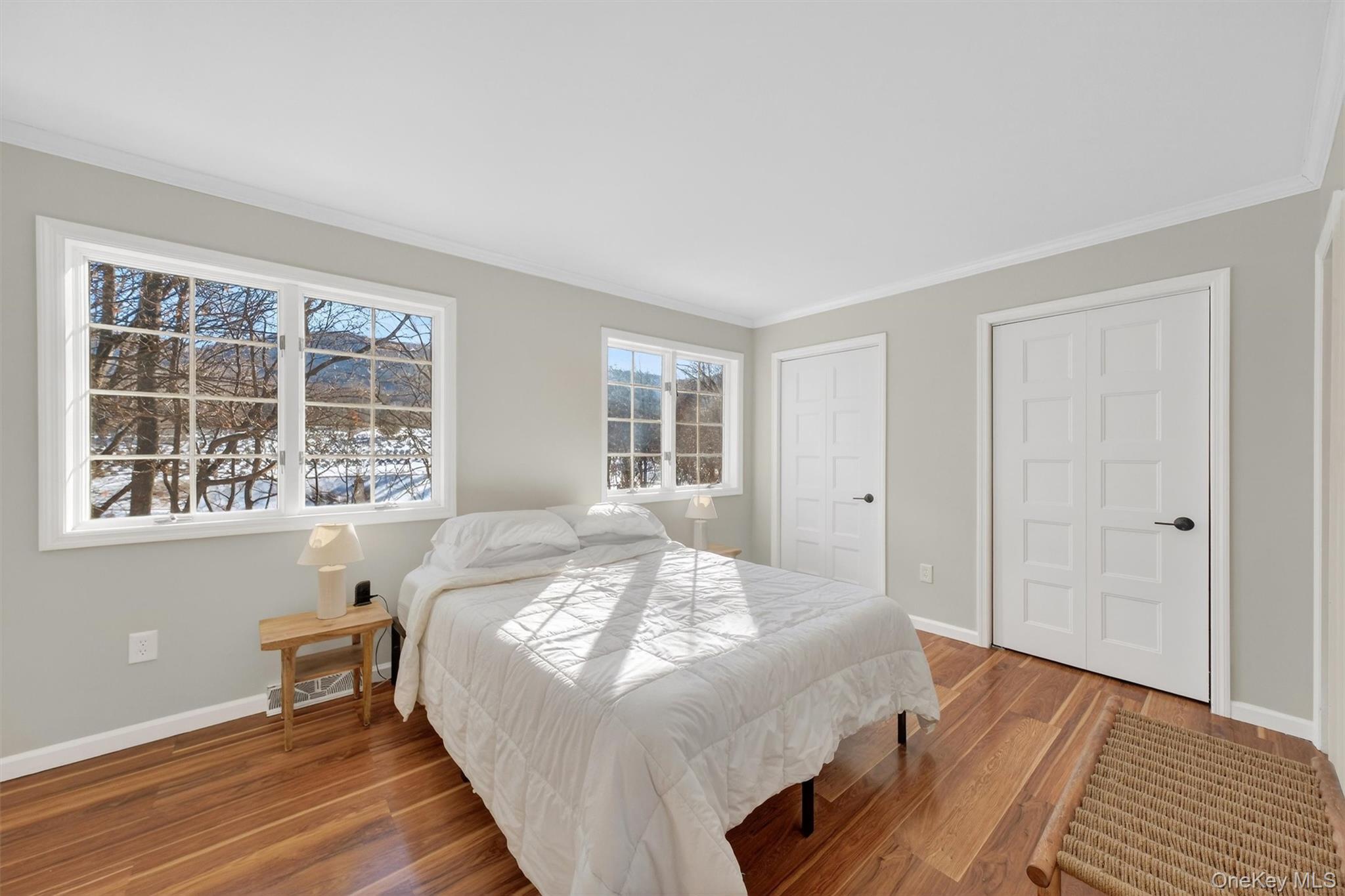 90 Roundtree Court Beacon, NY 12508 - Photo 25 of 39 a bed sitting in a spacious bedroom next to a window