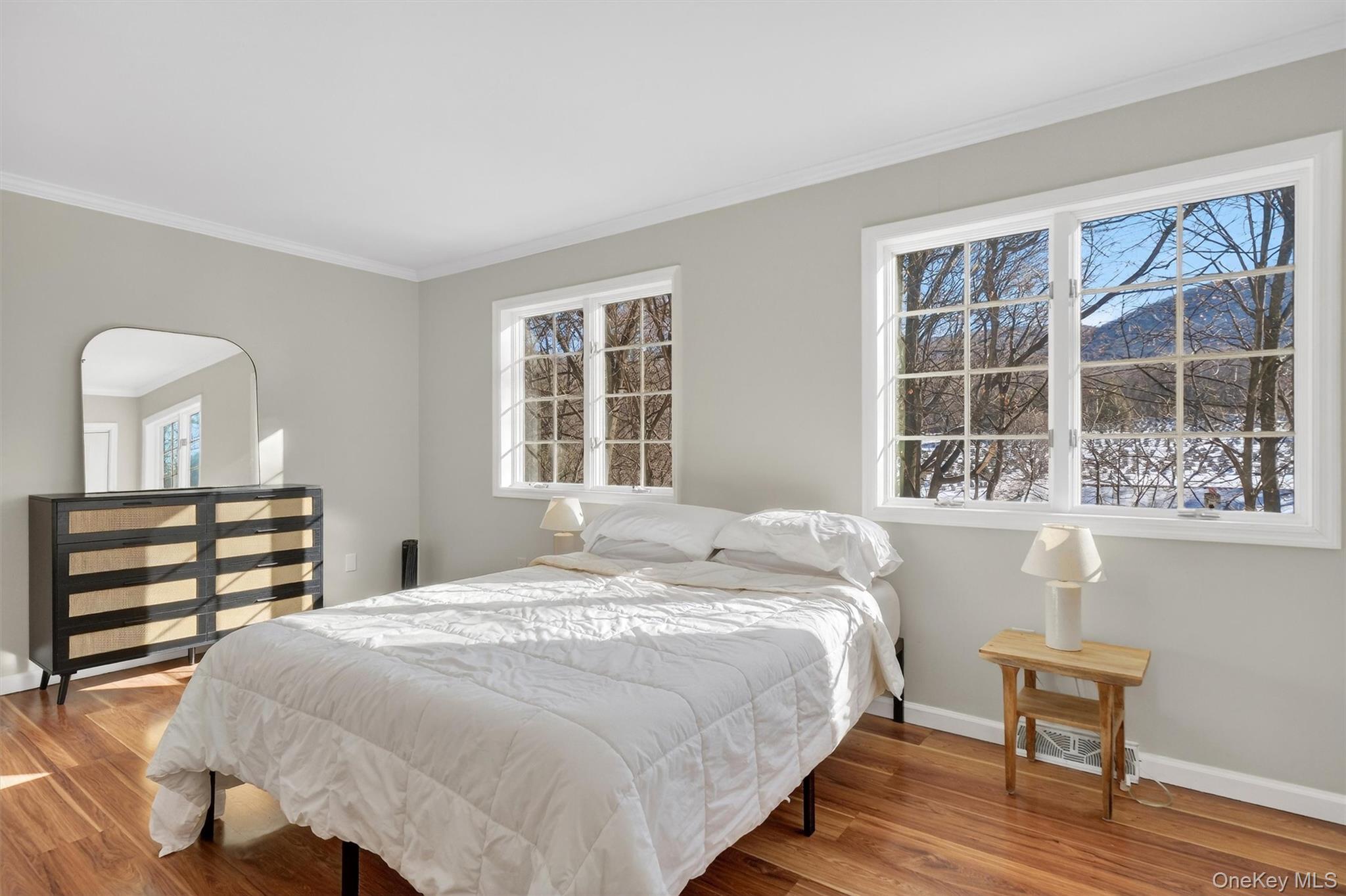 90 Roundtree Court Beacon, NY 12508 - Photo 28 of 39 a bedroom with a bed and a large window