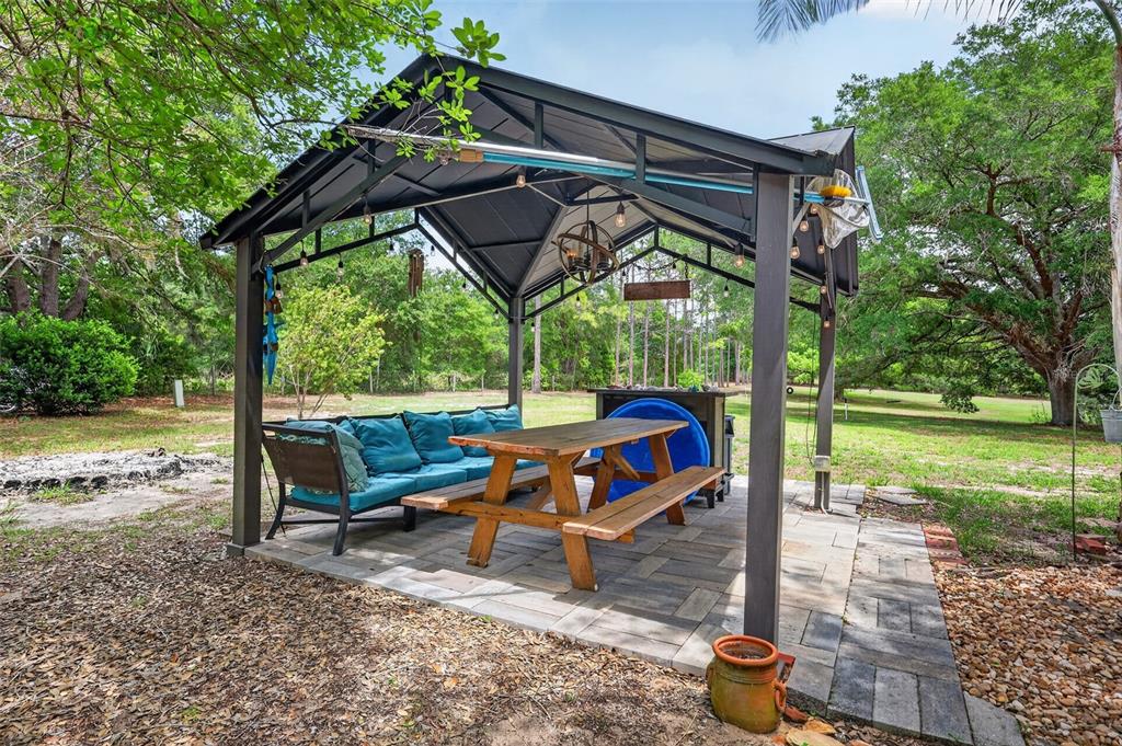 40635 Thomas Boat Landing Road Umatilla, FL 32784 - Photo 15 of 44 a view of park with wooden floor and roof
