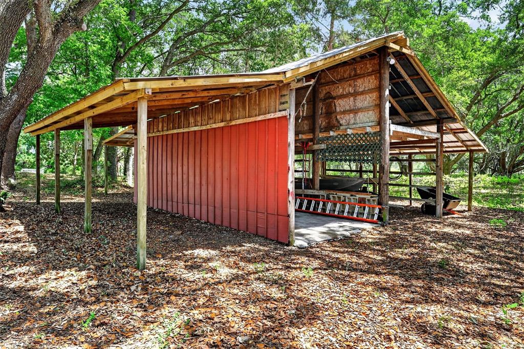 40635 Thomas Boat Landing Road Umatilla, FL 32784 - Photo 39 of 44 a view of a house with a yard