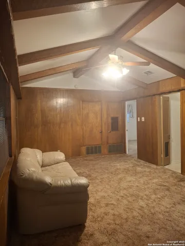 a room with a bed and a bathroom