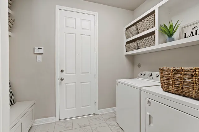 a view of a bedroom from a hallway