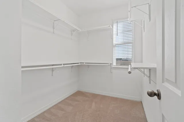 a bathroom with a sink a vanity and a mirror