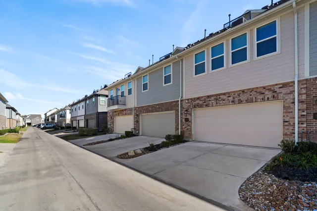 a view of a porch with chairs and backyard