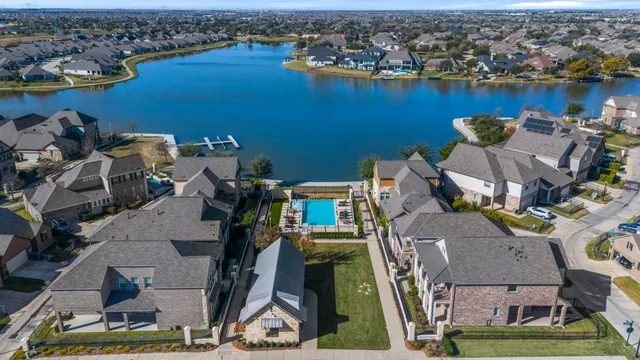an aerial view of a house with outdoor space