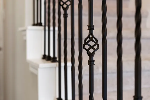 an entryway with a livingroom and stairs