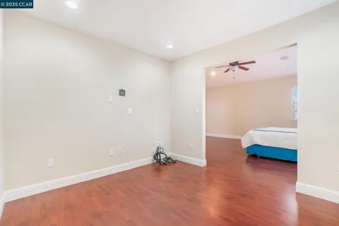 a view of a livingroom with wooden floor