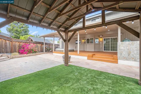a outdoor space with lots of potted plants