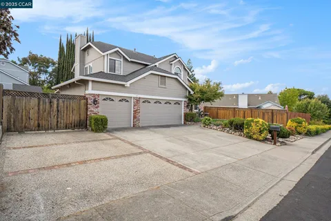 front view of a house with a street