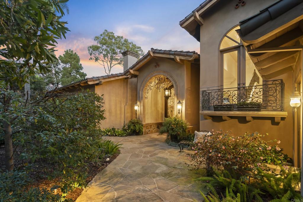 4724 El Aspecto Rancho Santa Fe, CA 92067 - Photo 22 of 23 a front view of a house with a yard