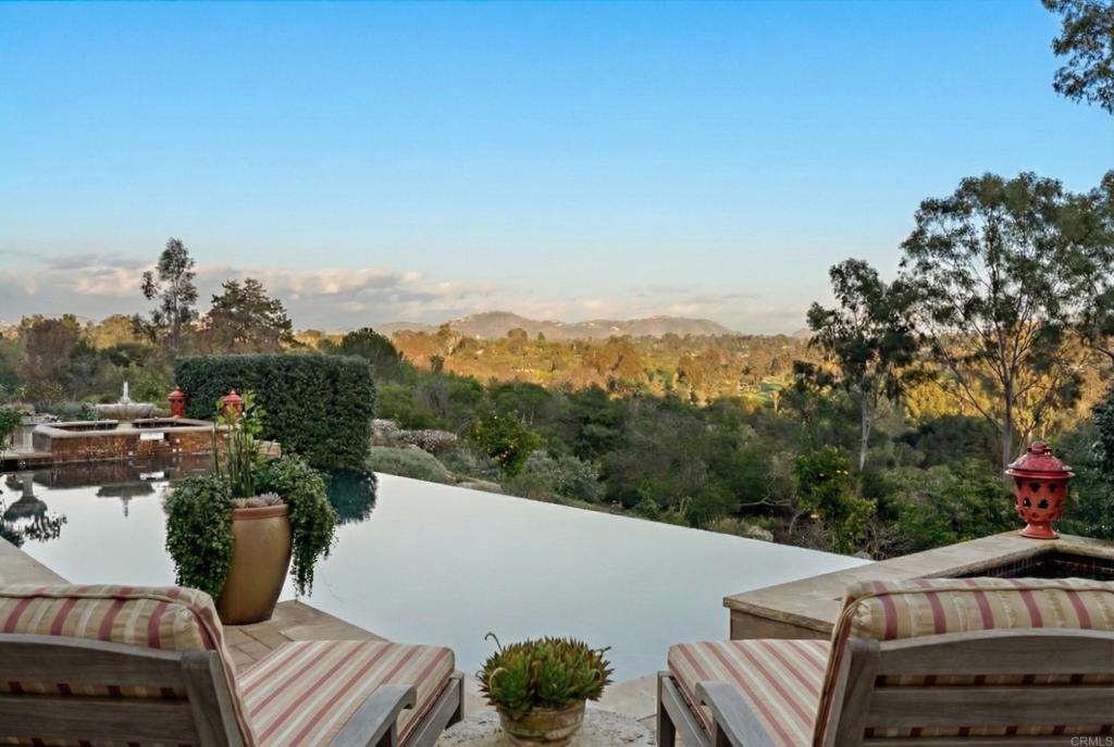 4724 El Aspecto Rancho Santa Fe, CA 92067 - Photo 3 of 23 a view of city from terrace with seating space