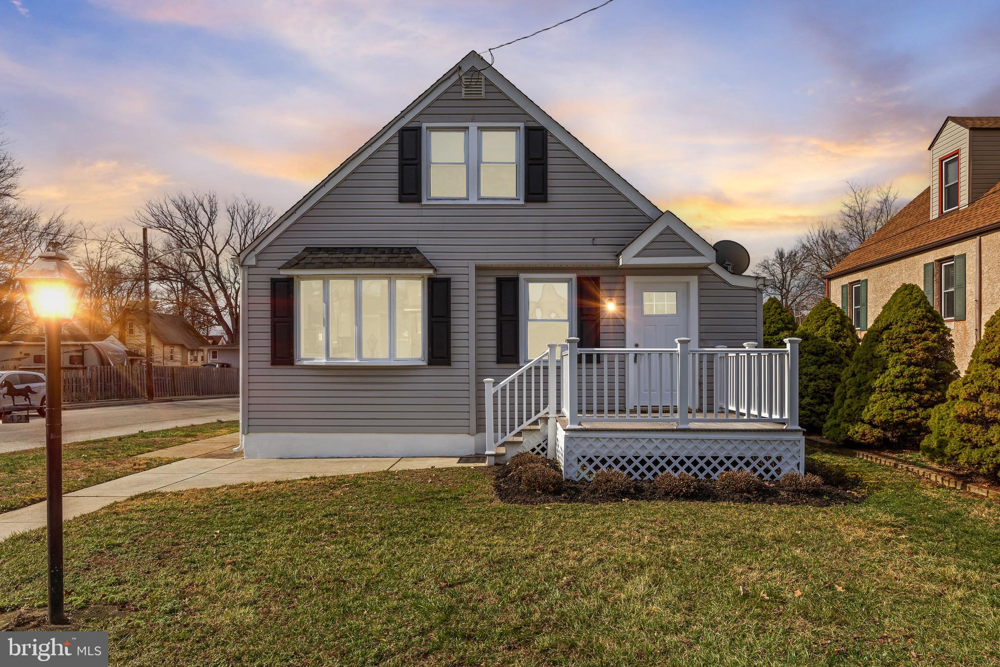 a view of a house with a small yard