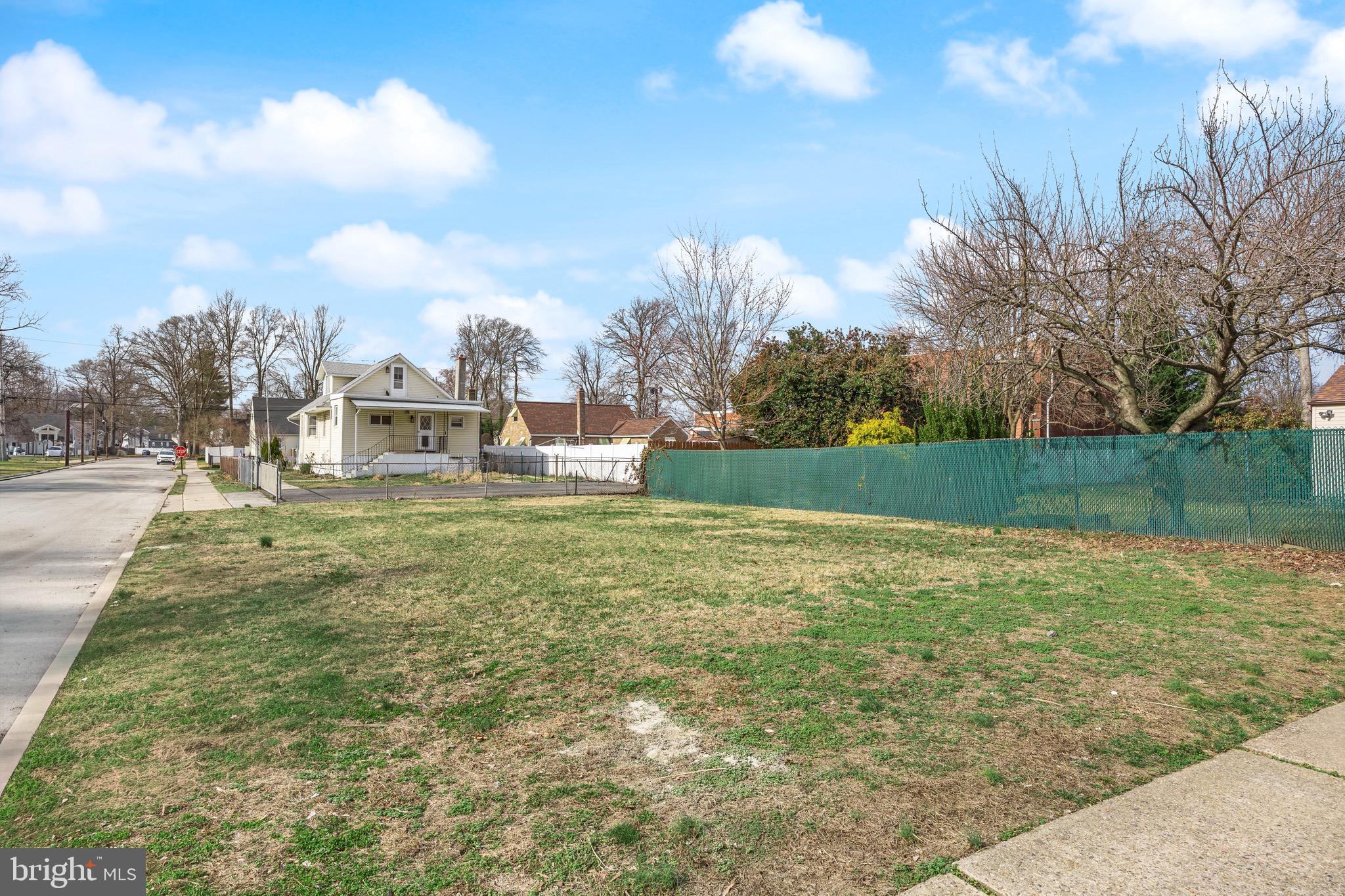 42 Spruce Avenue Maple Shade, NJ 08052 - Photo 25 of 27 a view of a street with a yard and a fountain