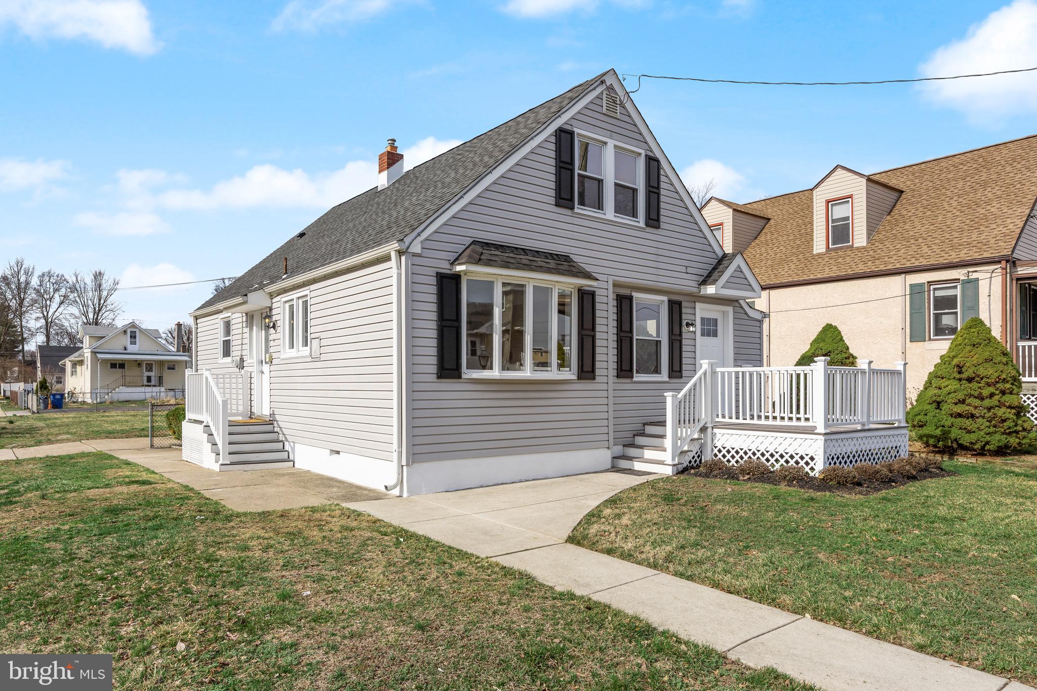 42 Spruce Avenue Maple Shade, NJ 08052 - Photo 3 of 27 a front view of a house with a yard
