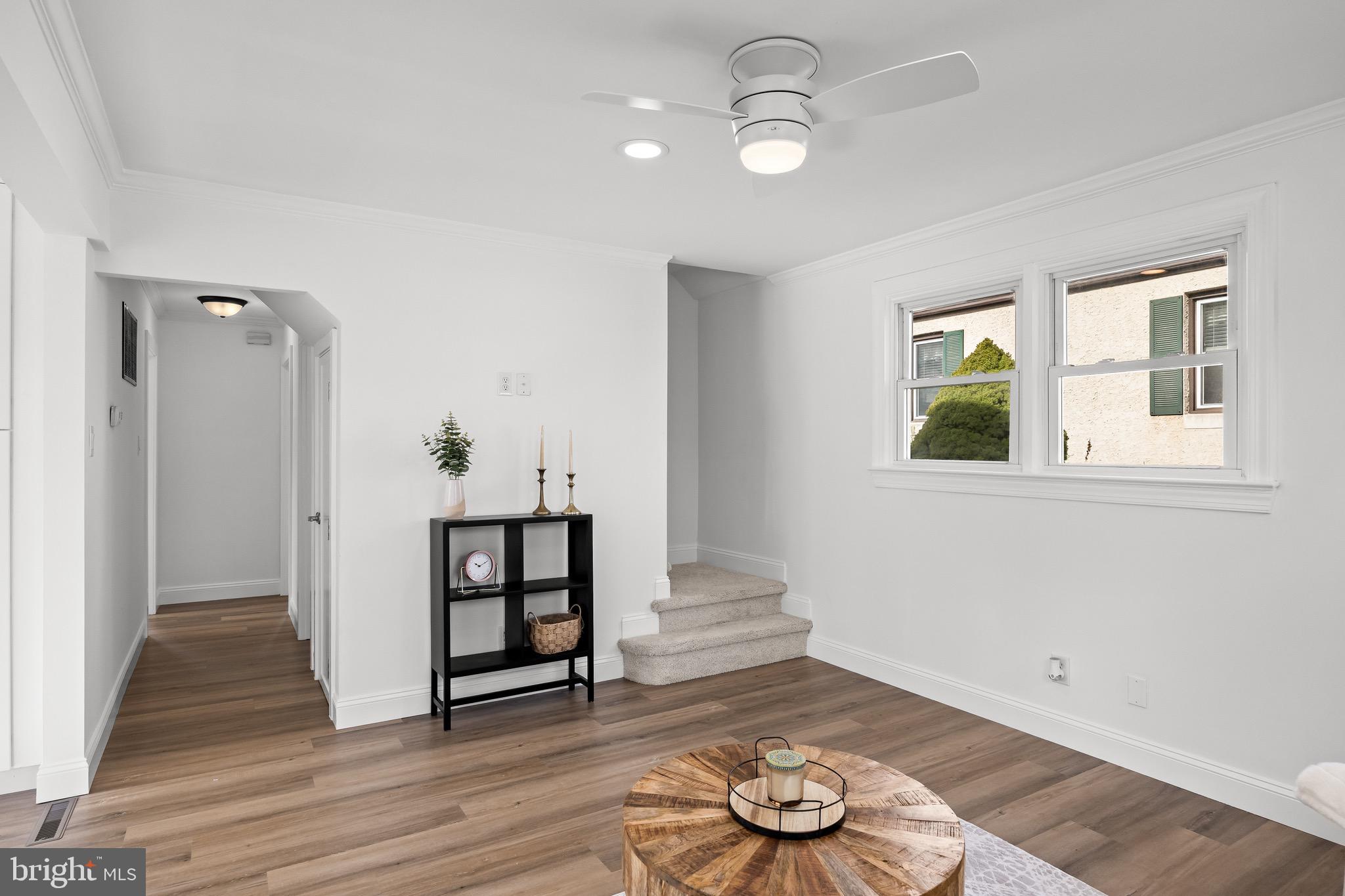 42 Spruce Avenue Maple Shade, NJ 08052 - Photo 9 of 27 an empty room with wooden floor cabinet and window