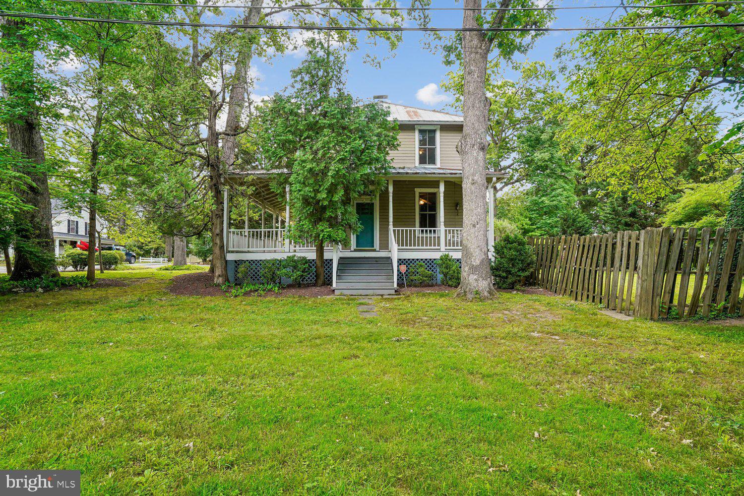 16 Maple Avenue Washington Grove, MD 20880 - Photo 3 of 58 Charming home embraced by lush greenery.