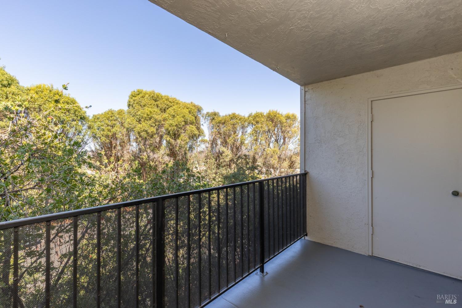 199 Posada Del Sol Novato, CA 94949 - Photo 7 of 16 a balcony with an outdoor space