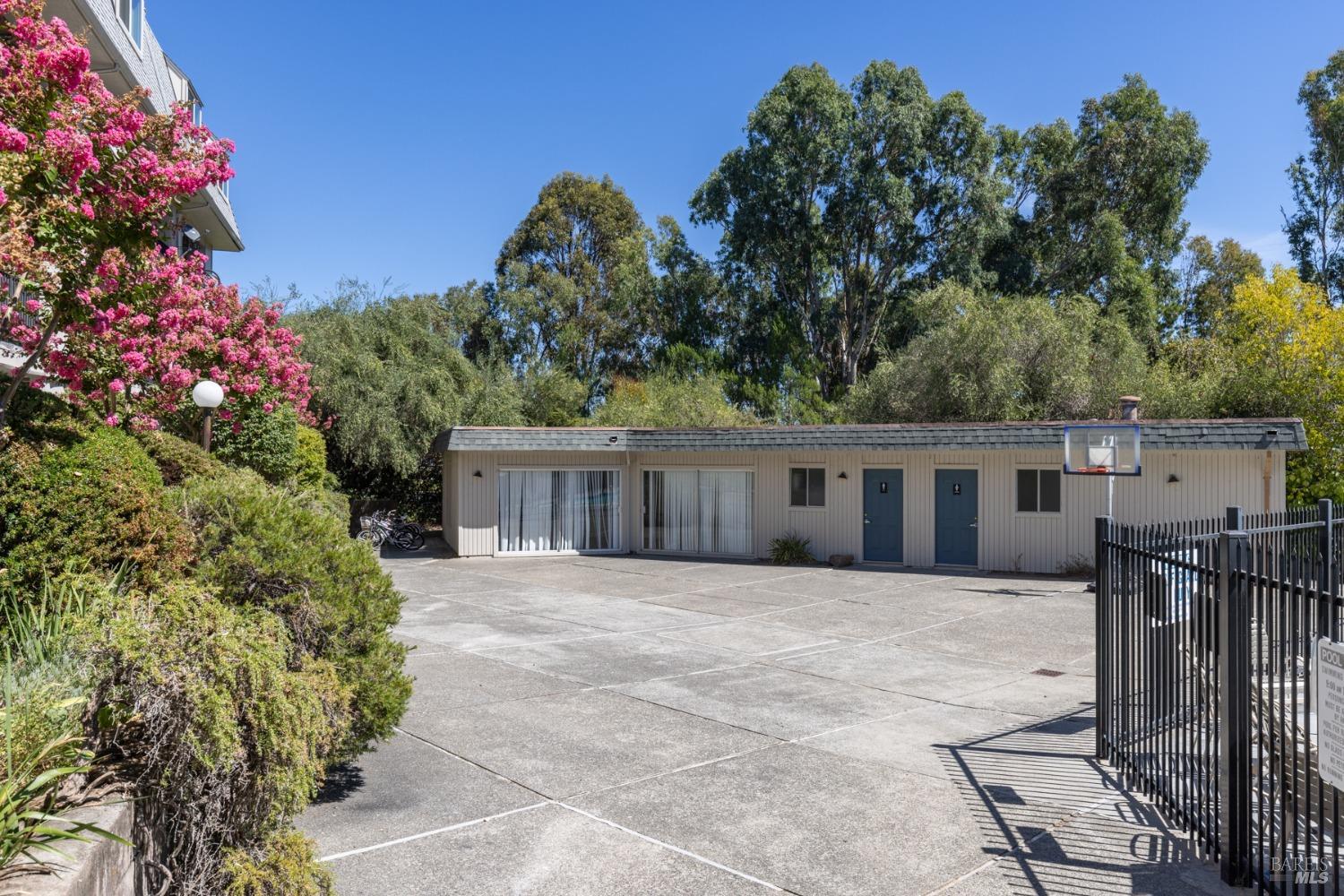 199 Posada Del Sol Novato, CA 94949 - Photo 9 of 16 a front view of house with yard and trees around
