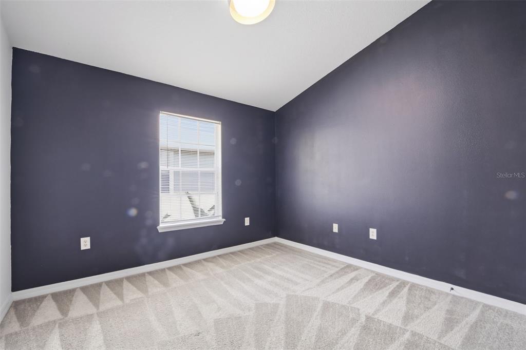 27547 Pleasure Ride Loop Wesley Chapel, FL 33544 - Photo 15 of 40 a view of an empty room with a window
