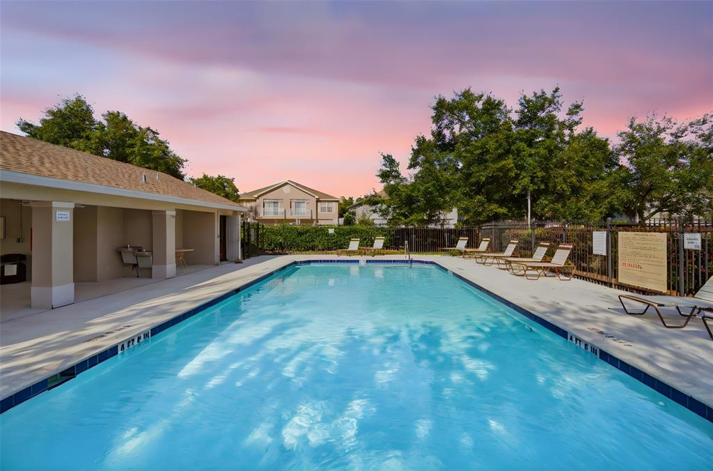 27547 Pleasure Ride Loop Wesley Chapel, FL 33544 - Photo 39 of 40 a view of a house with swimming pool and sitting area