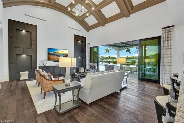 a kitchen with stainless steel appliances granite countertop a stove and cabinets