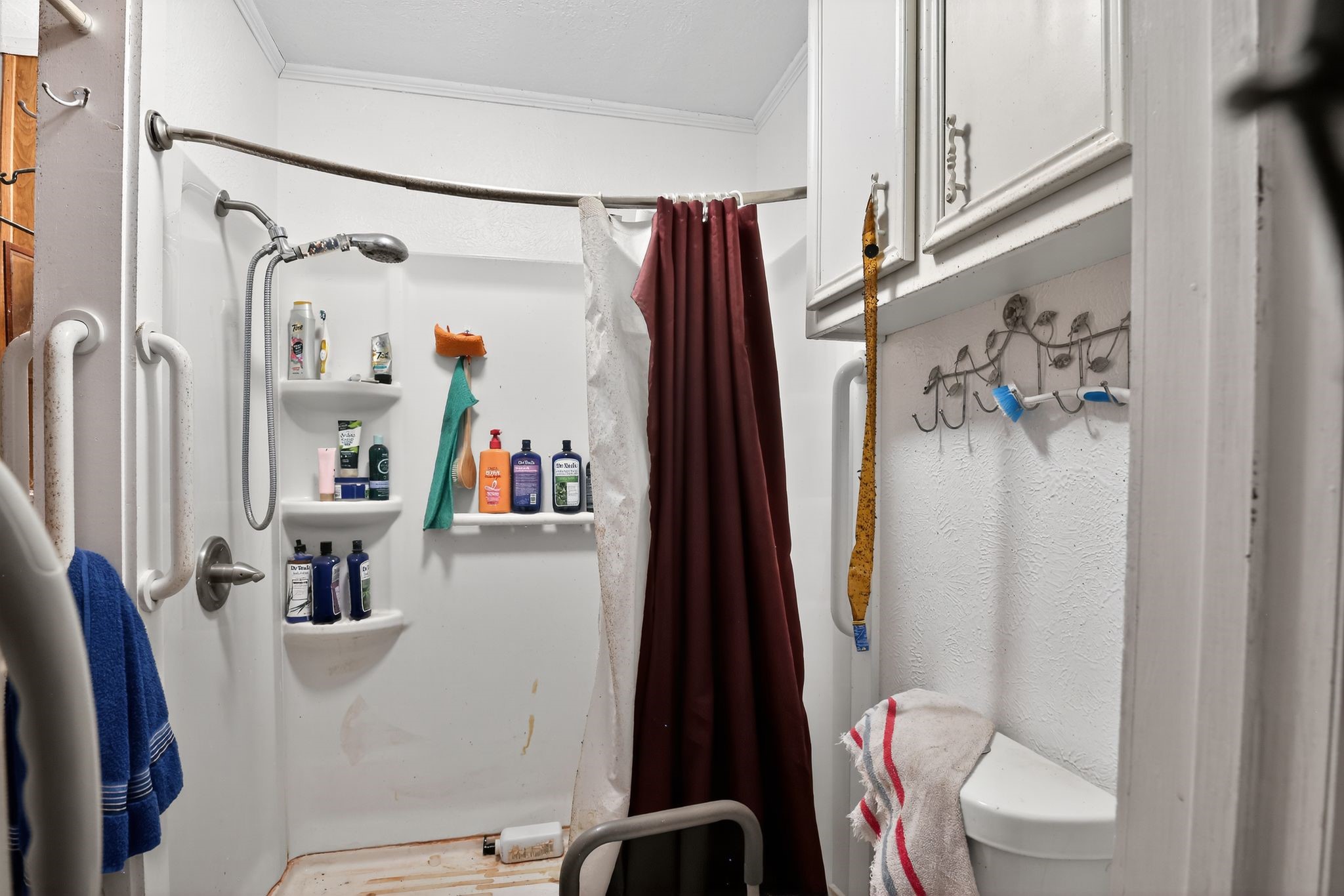 2319 Woodville Road Bryan, TX 77803 - Photo 11 of 15 a bathroom with a sink toilet and shower