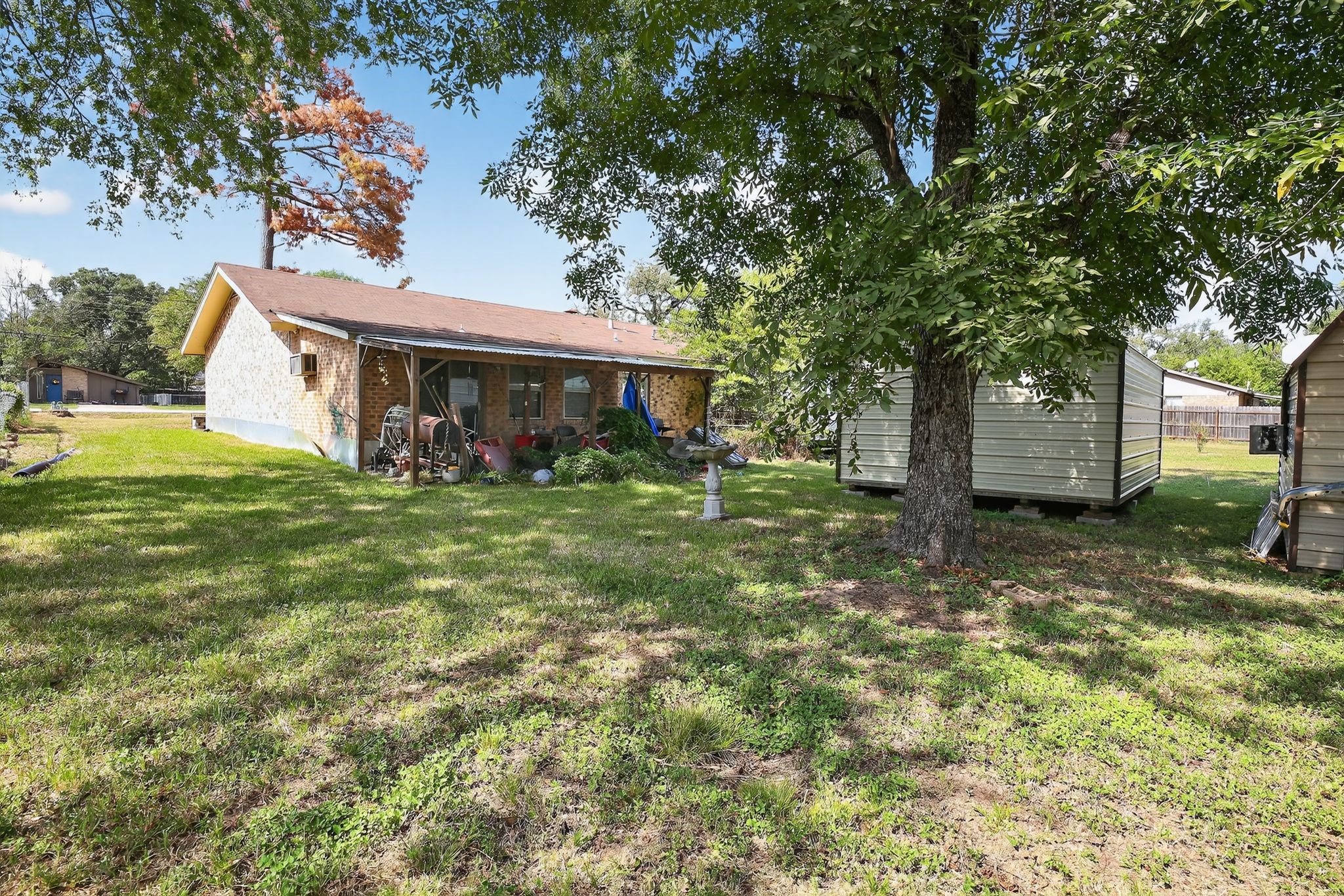 2319 Woodville Road Bryan, TX 77803 - Photo 14 of 15 a view of house with outdoor space